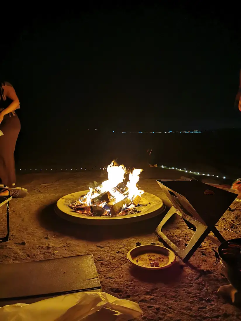 Fire and shared moments by the sea